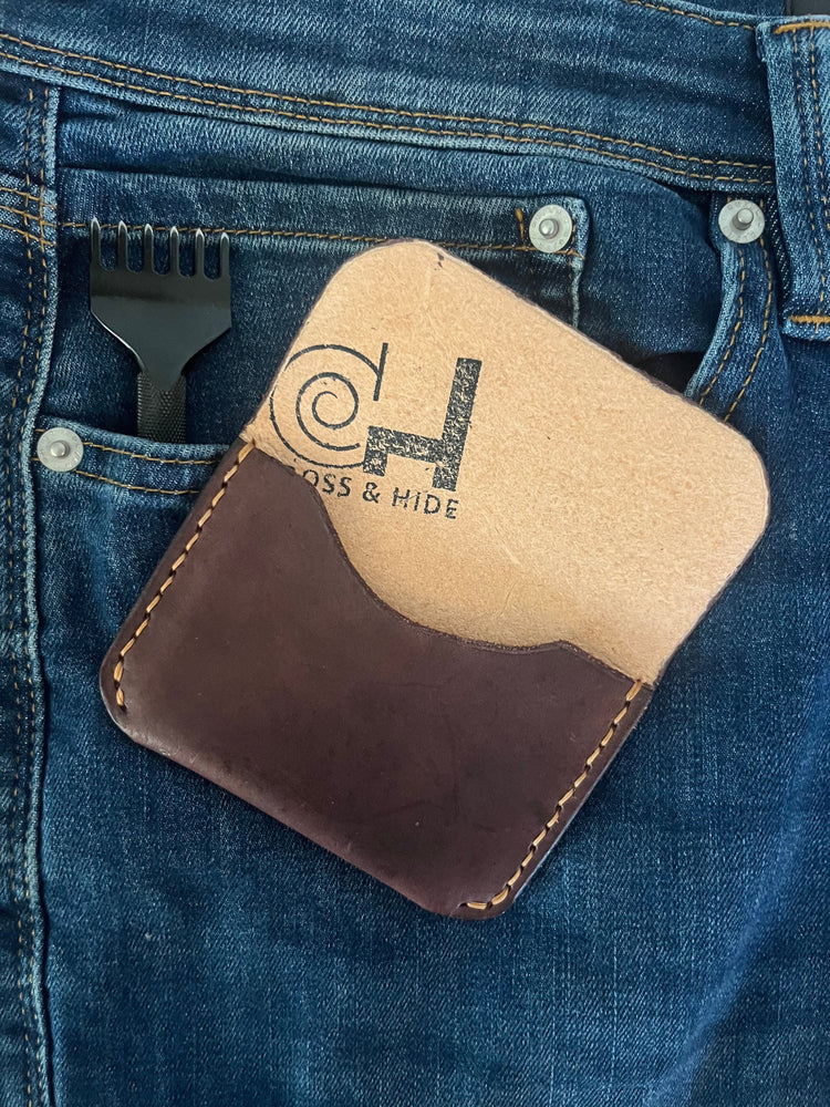 The stitched flap keeps your cards and cash secure while maintaining a minimalist silhouette. Perfect for travel, everyday carry, and showing off your good taste.